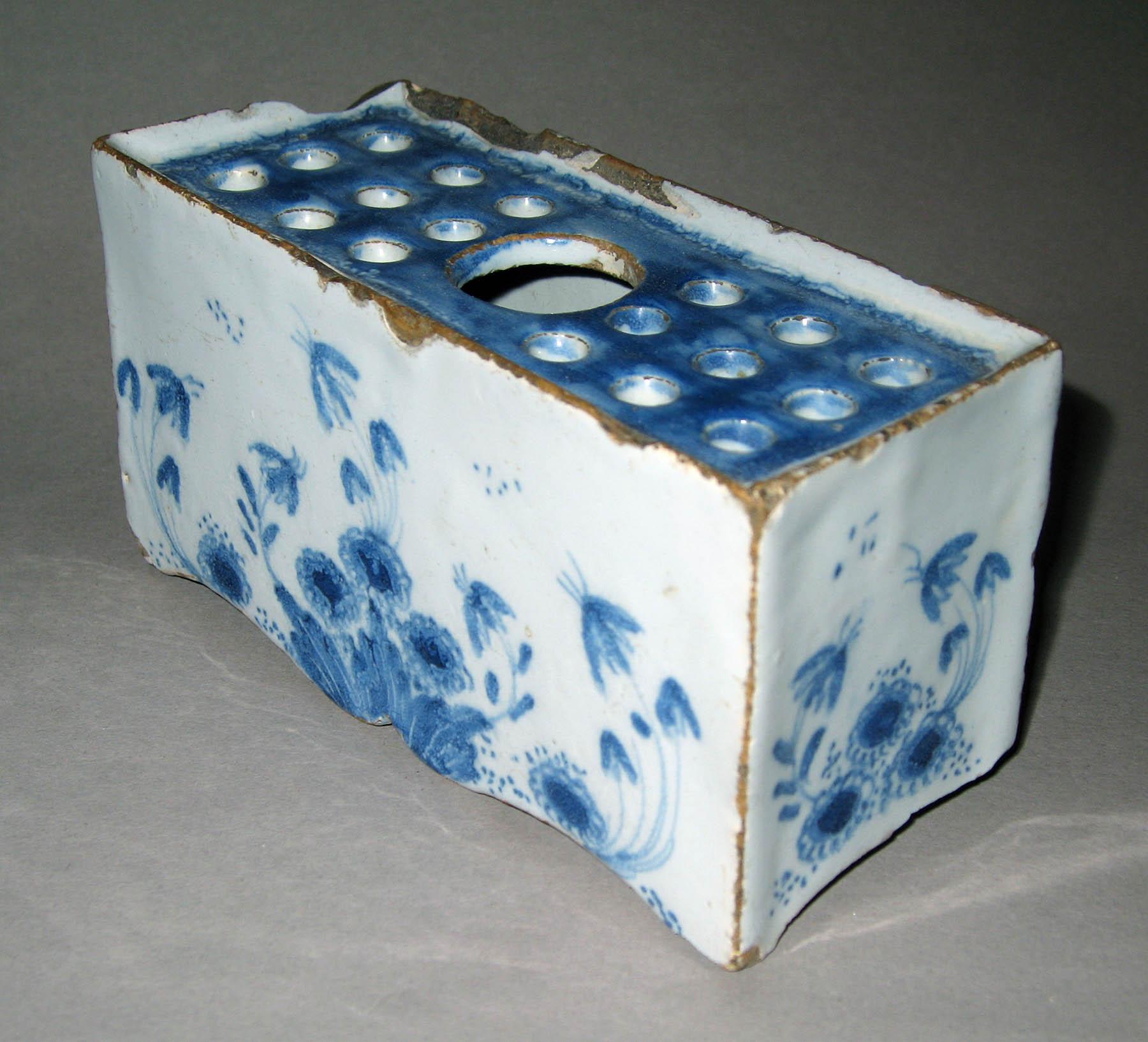 1964.0971.001 Earthenware flower brick