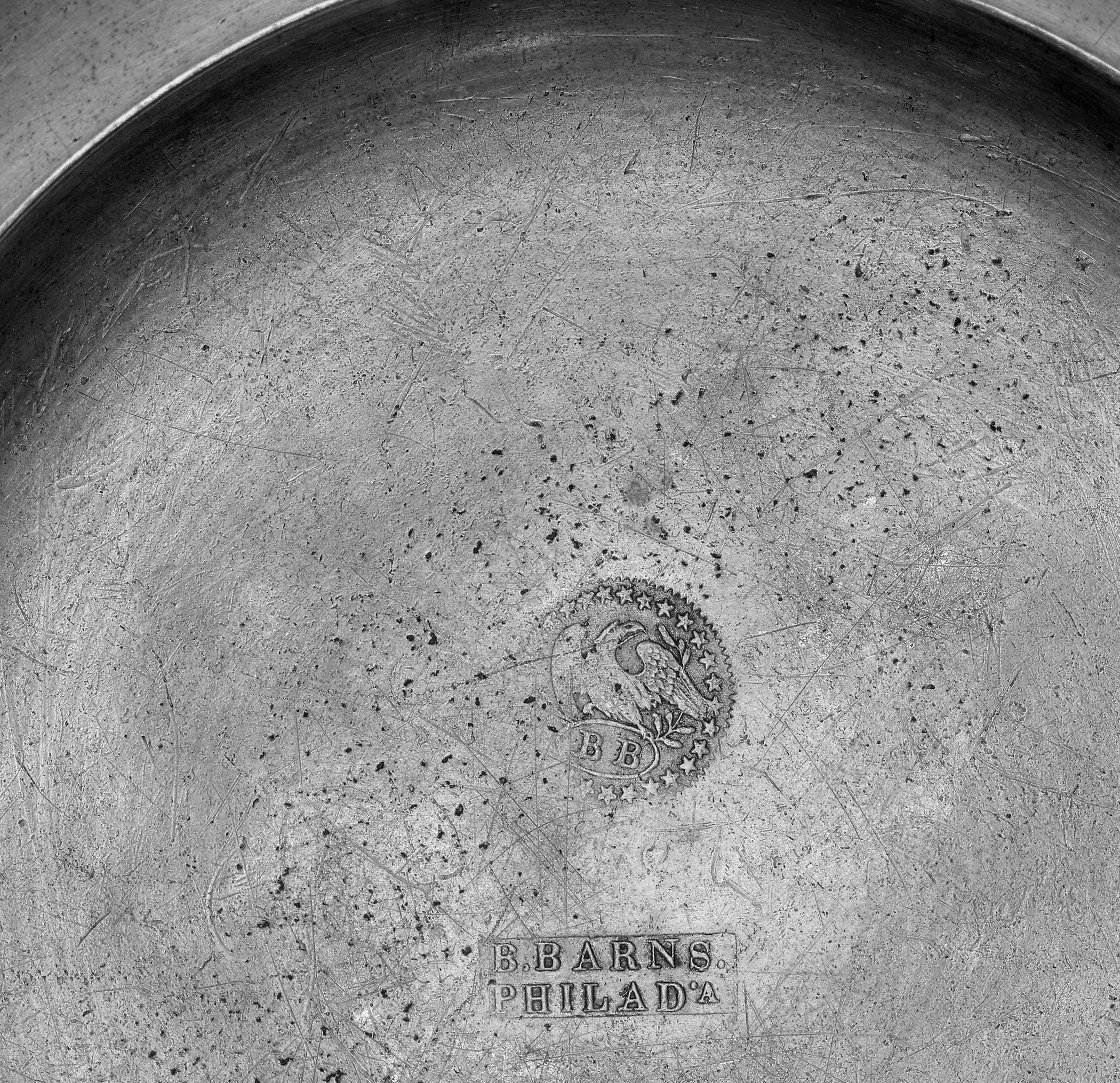 1964.1147 Pewter plate (mark)