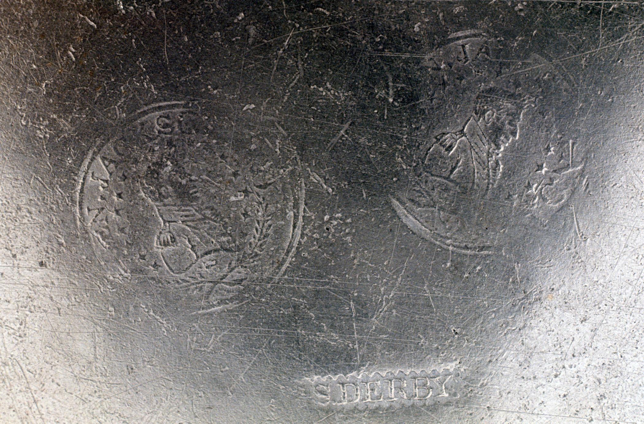 1964.1156 Pewter plate (marks)
