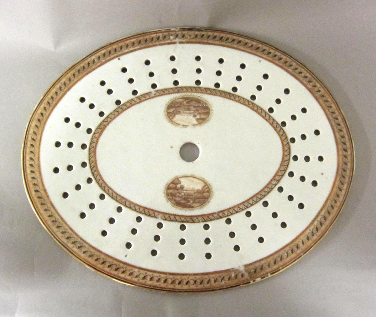1964.1253.002 Porcelain strainer retake