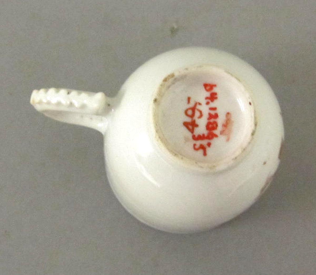 1964.1286.035 Porcelain coffee cup underside