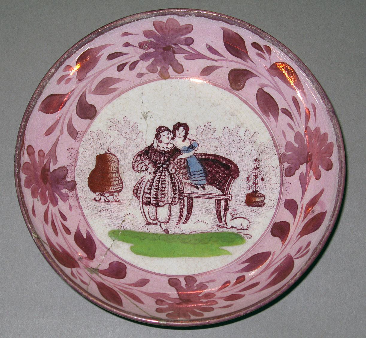 1964.1298.001 Lusterware saucer