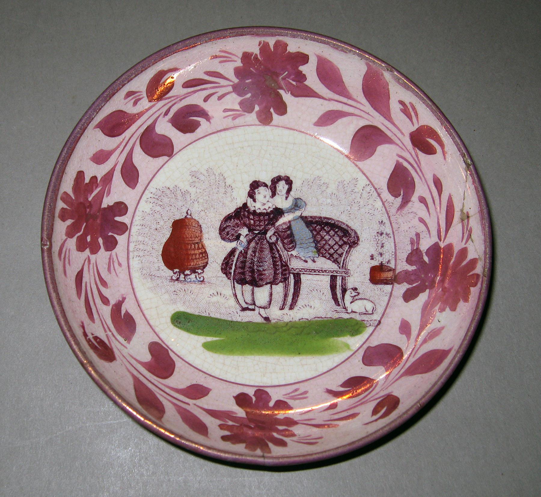 1964.1298.002 Lusterware saucer