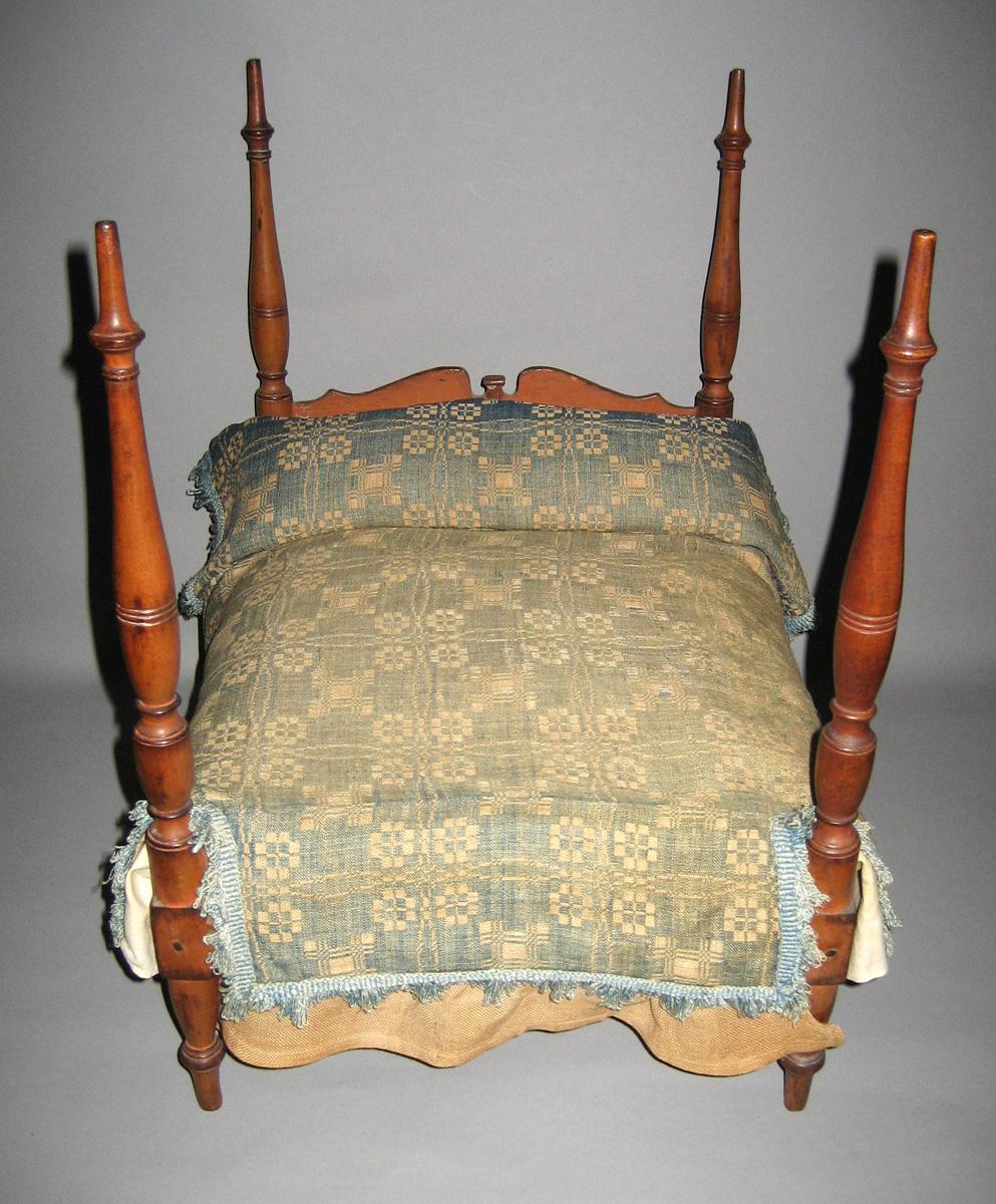 1964.1324 miniature bed with bedcover 1964.2071c view 2