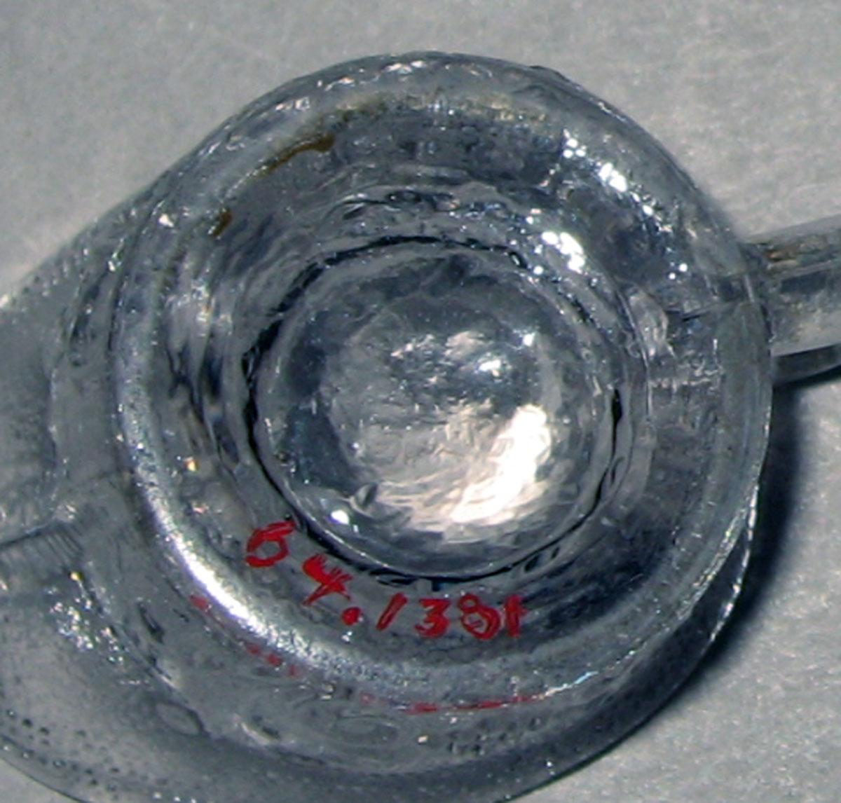 1964.1381 Miniature jug (underside)
