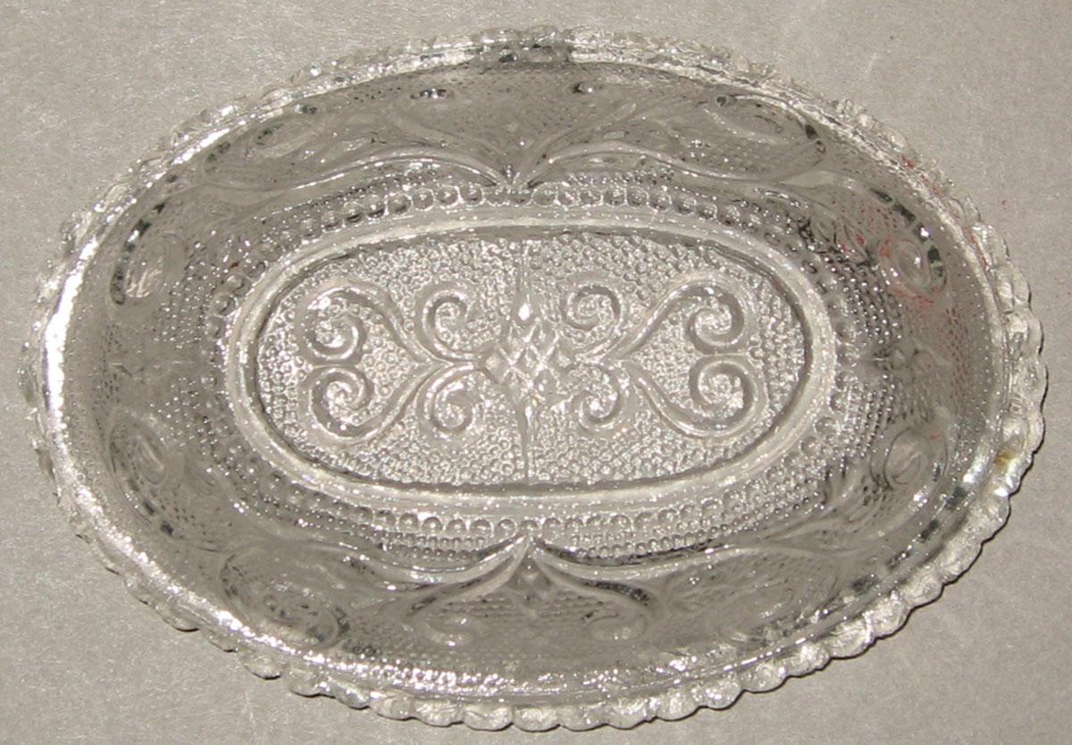 1964.1384.002 Colorless glass pressed dish (underside)