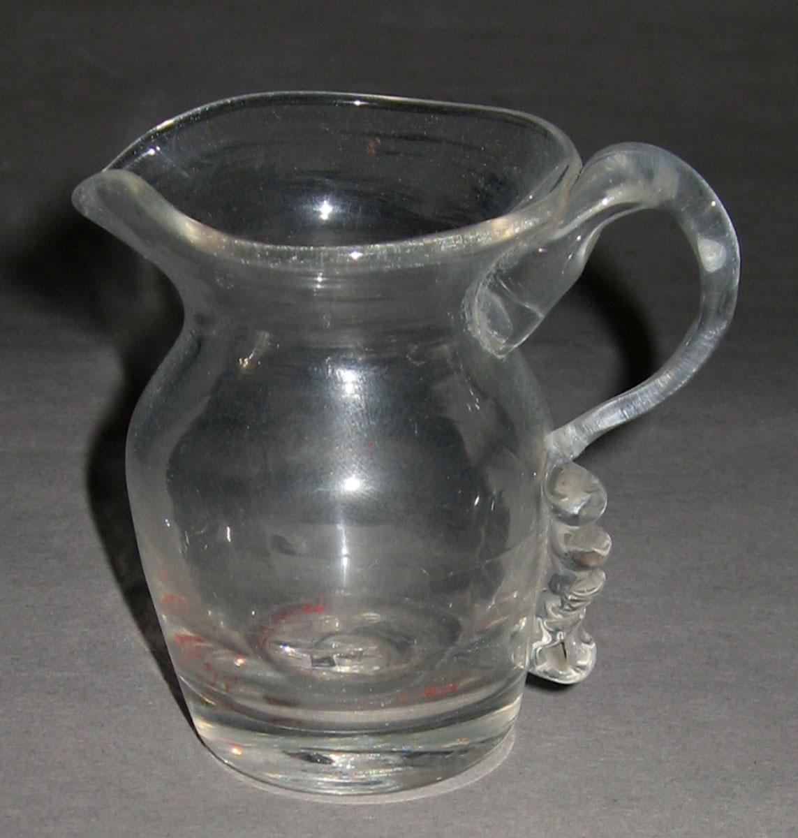 1964.1393 Colorless miniature jug