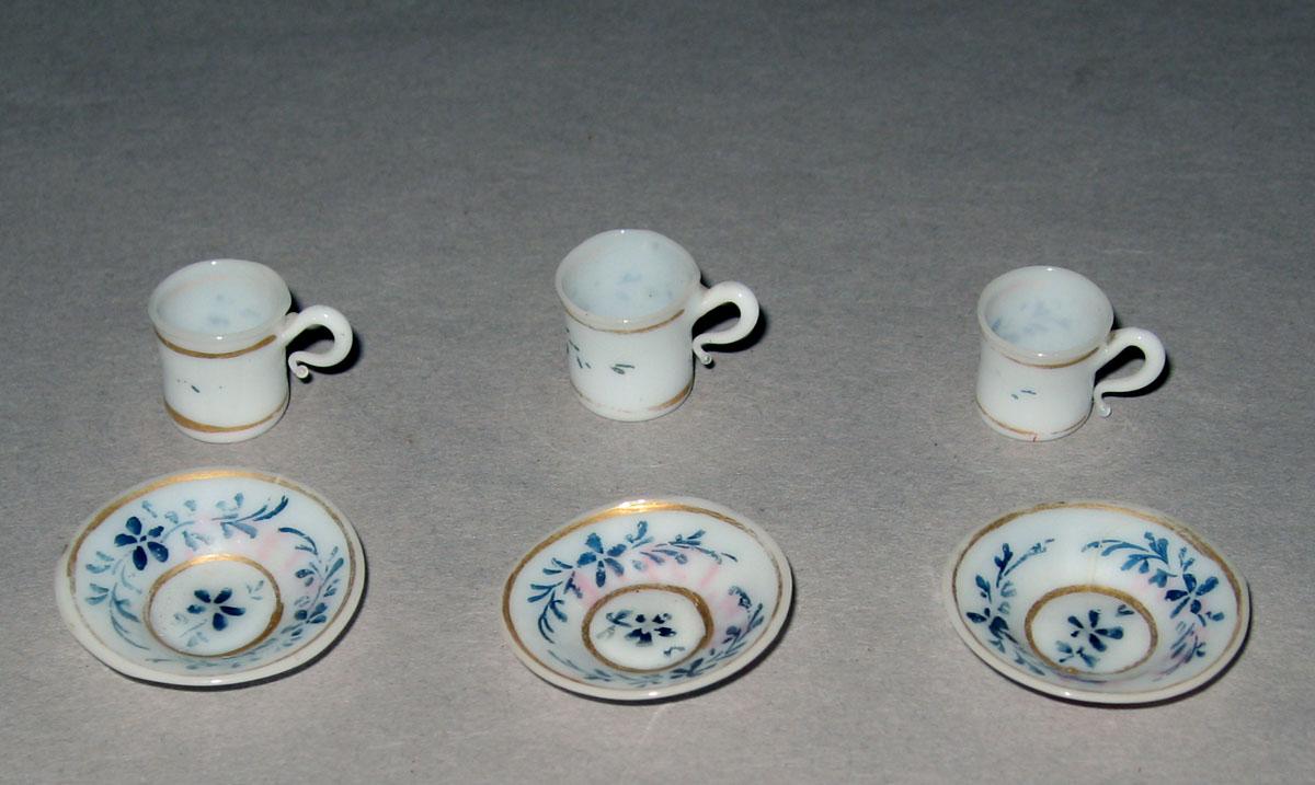 1964.1397.001, .002, .004, .011, .008, .010 Miniature teacups and saucers