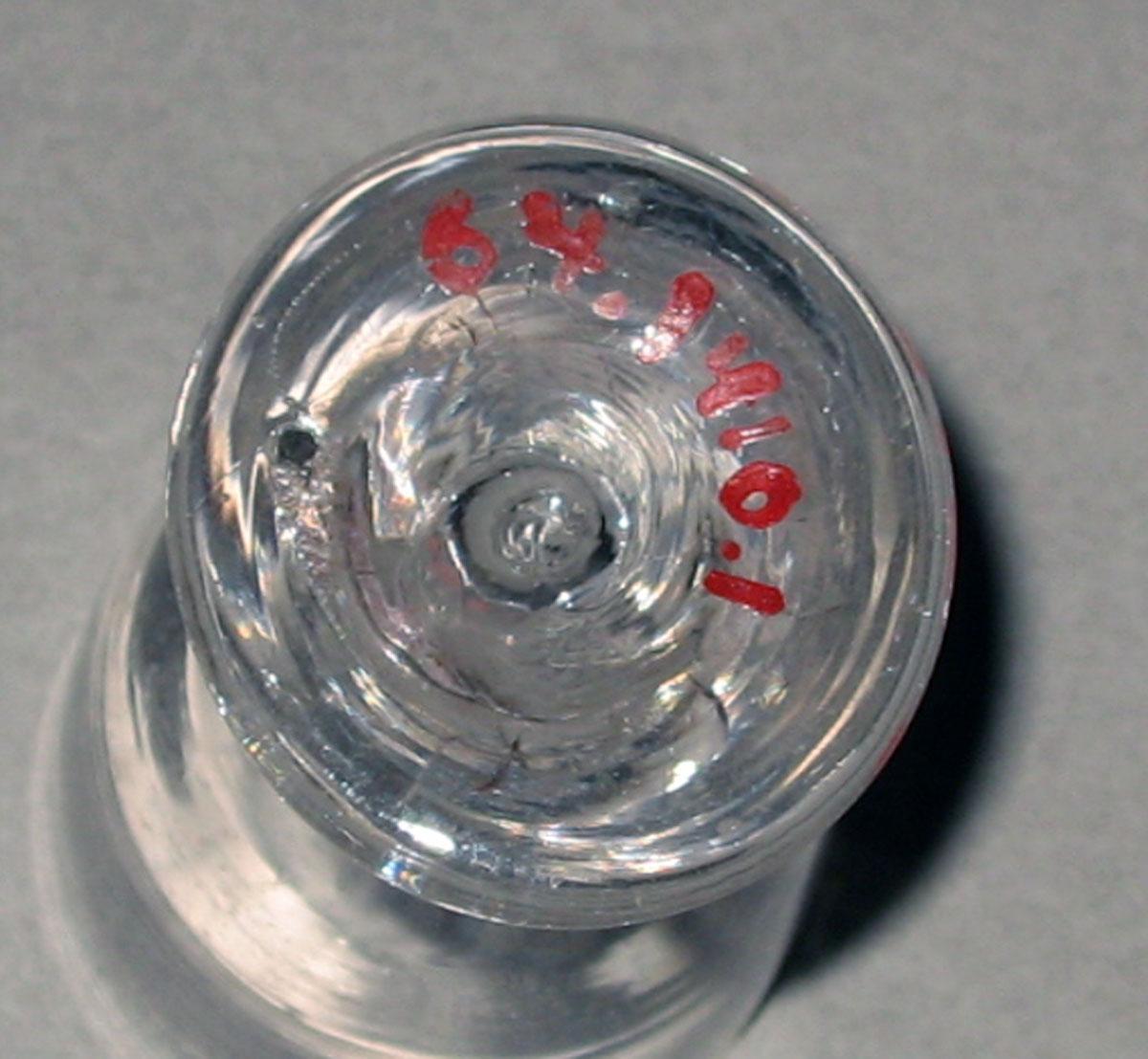 1964.1410.001 Miniature glass wineglass (underside)