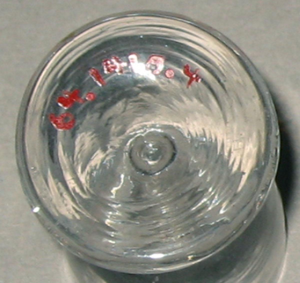 1964.1410.004 Miniature glass wineglass (underside)