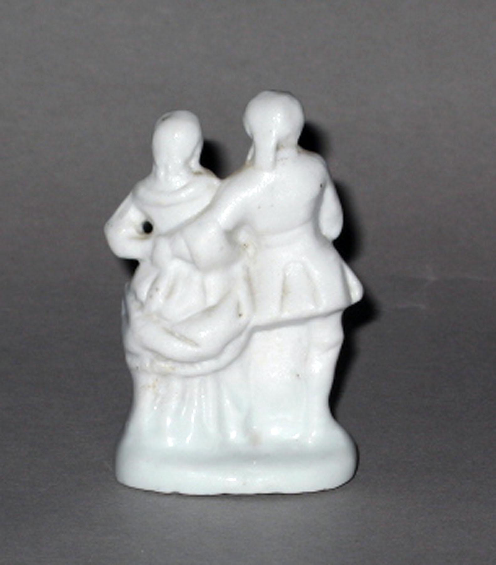 1964.1425 Miniature porcelain figure group (reverse)