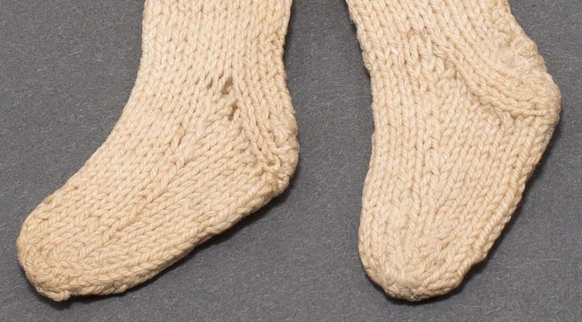1964.1479.001, .002 Miniature Stocking, Detail