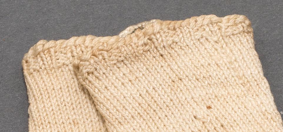 1964.1480.001, .002 Miniature Stocking, Detail 2