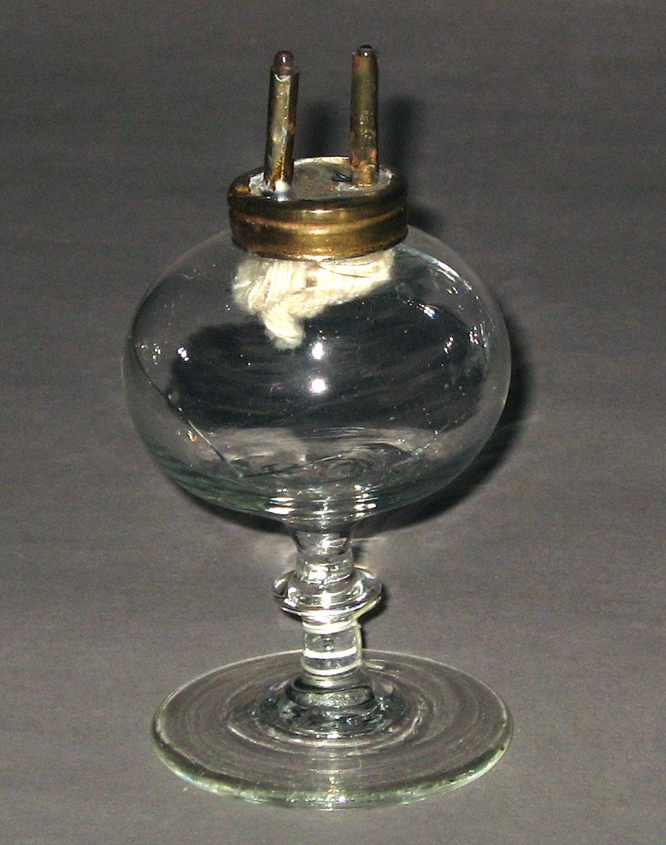 1964.1506 Colorless glass oil lamp