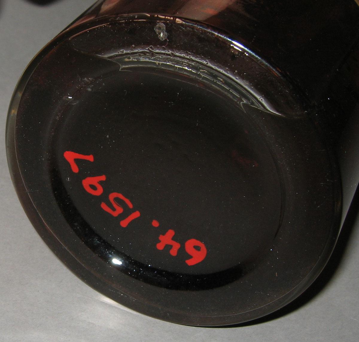 1964.1597 Wine bottle with Madiera (underside)