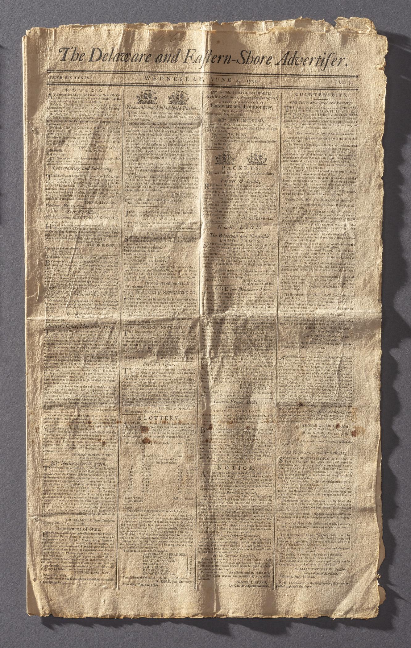 1964.1627 Newspaper, page 1, view 2, raking light