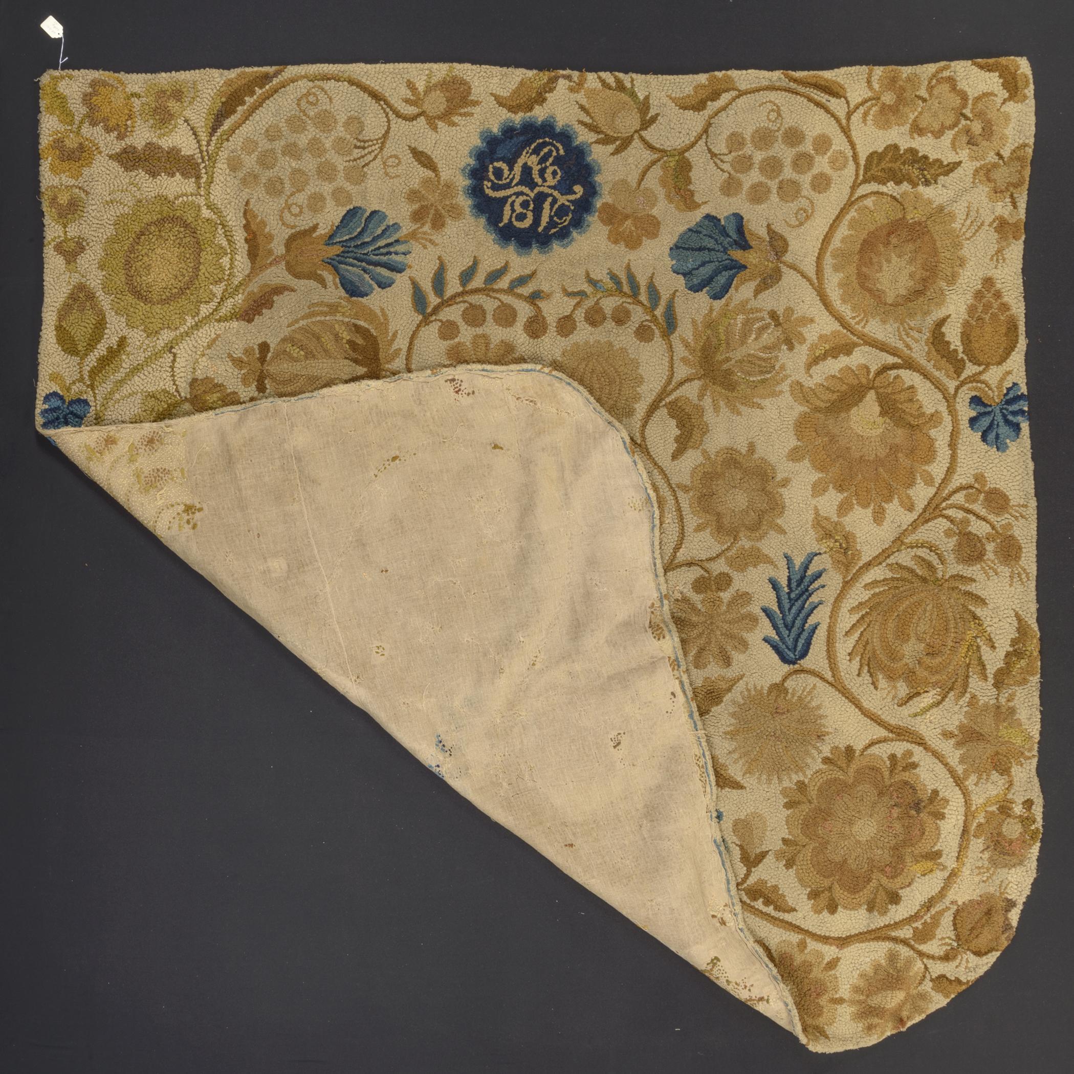 1964.1641 Bedcover, view 2, partial reverse