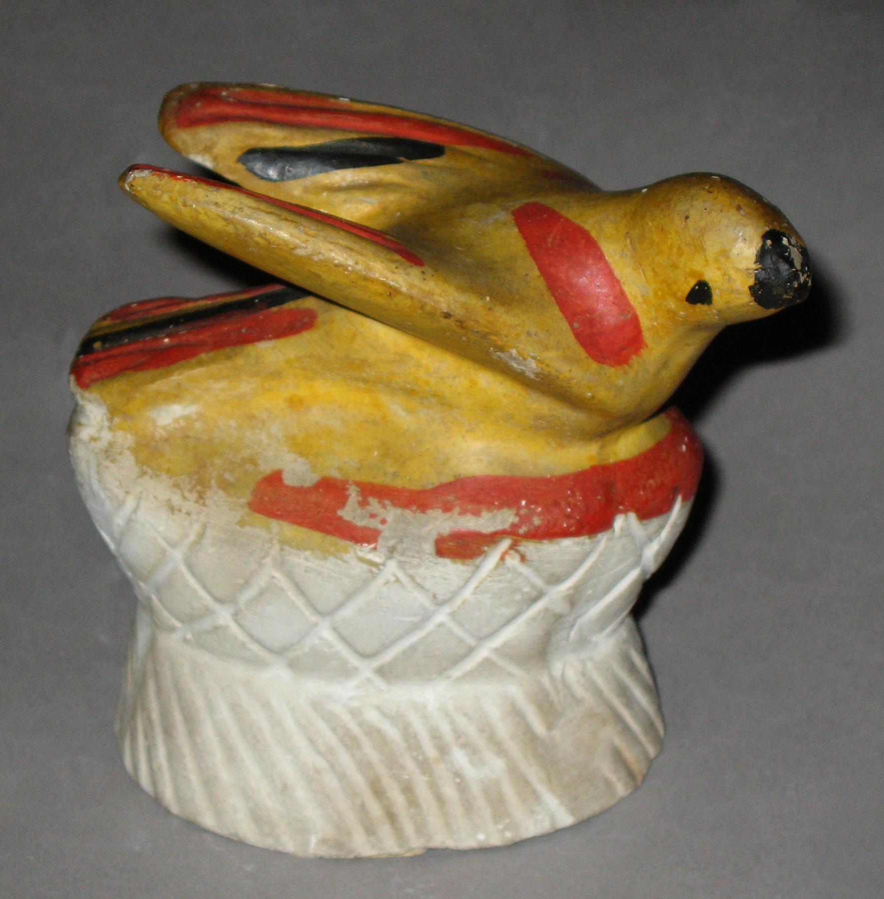 1964.1660 Chalkware bird in nest