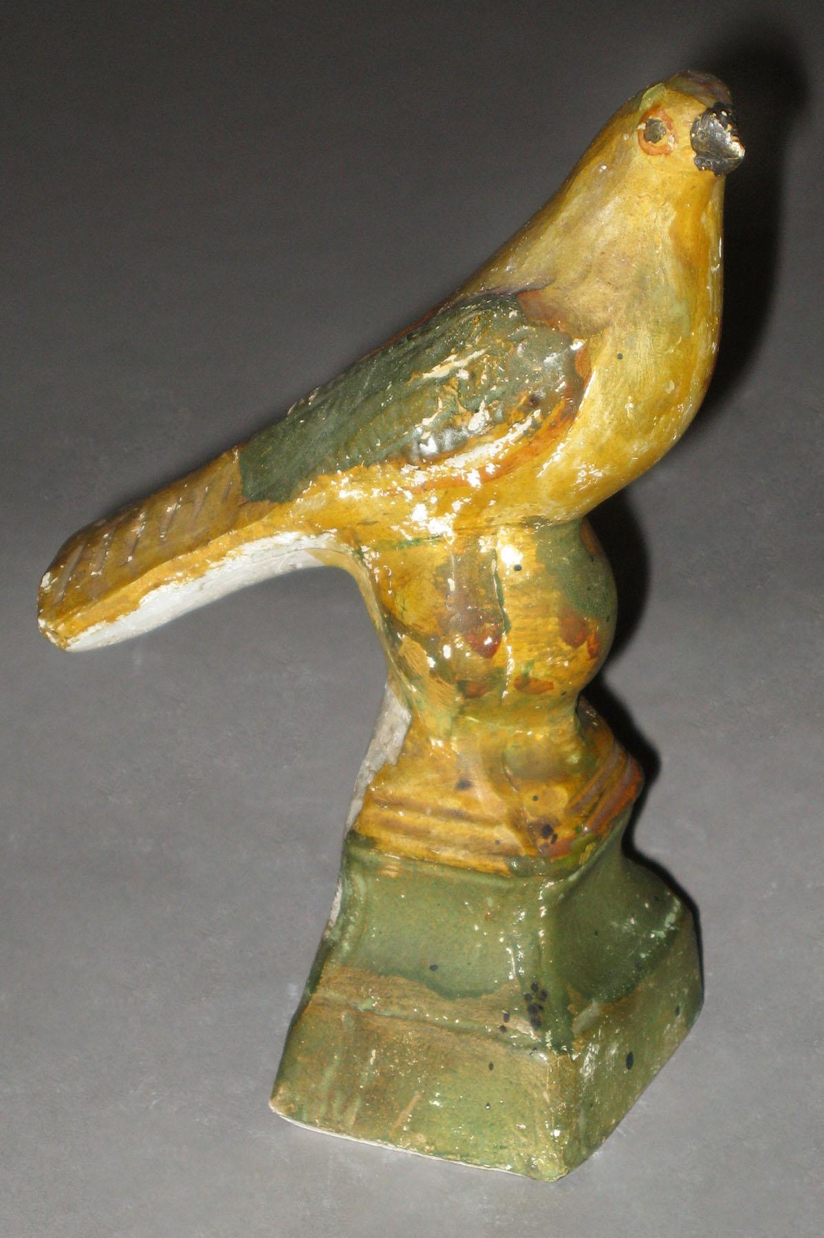 1964.1681 Chalkware bird on ball