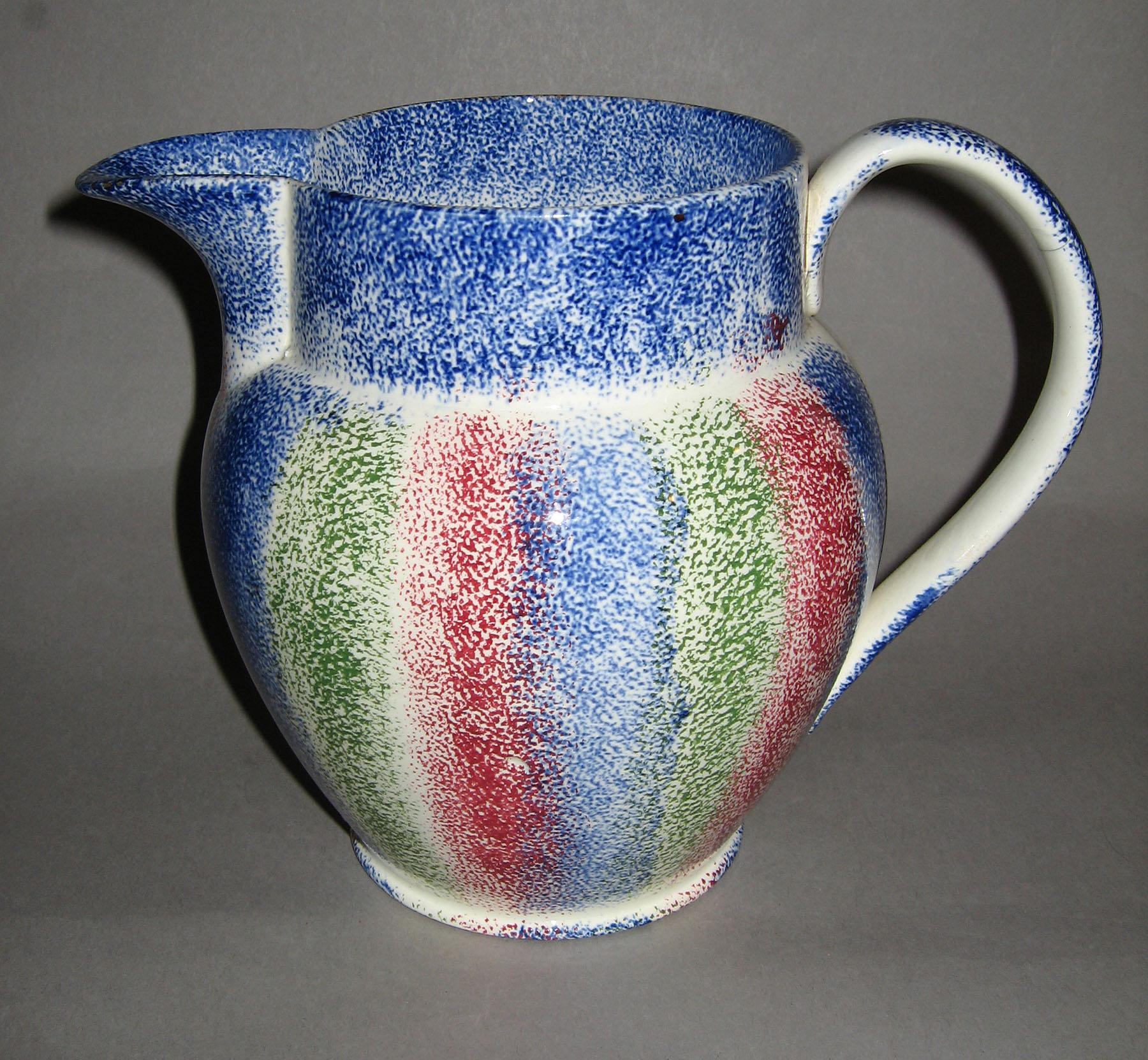1964.1723 Rainbow spatterware jug