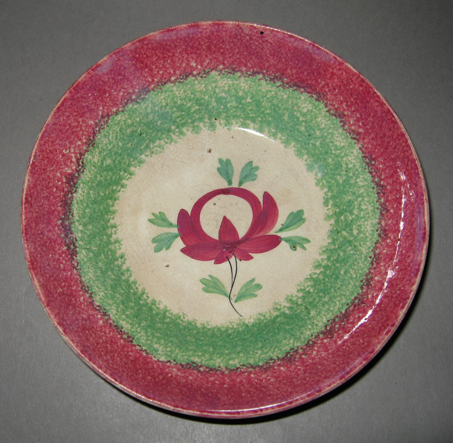 1964.1724 Spatterware saucer