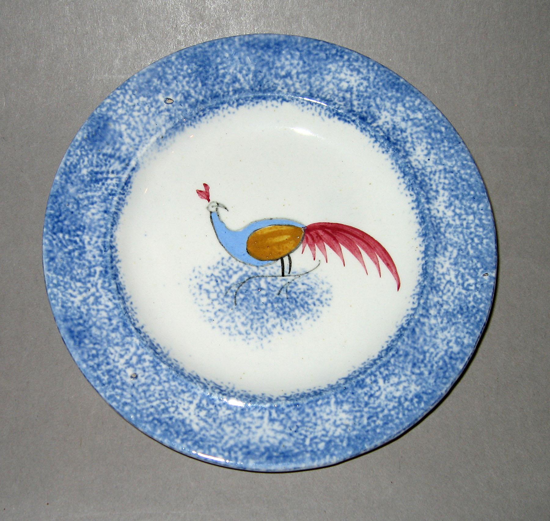 1964.1725 Blue spatterware peafowl plate