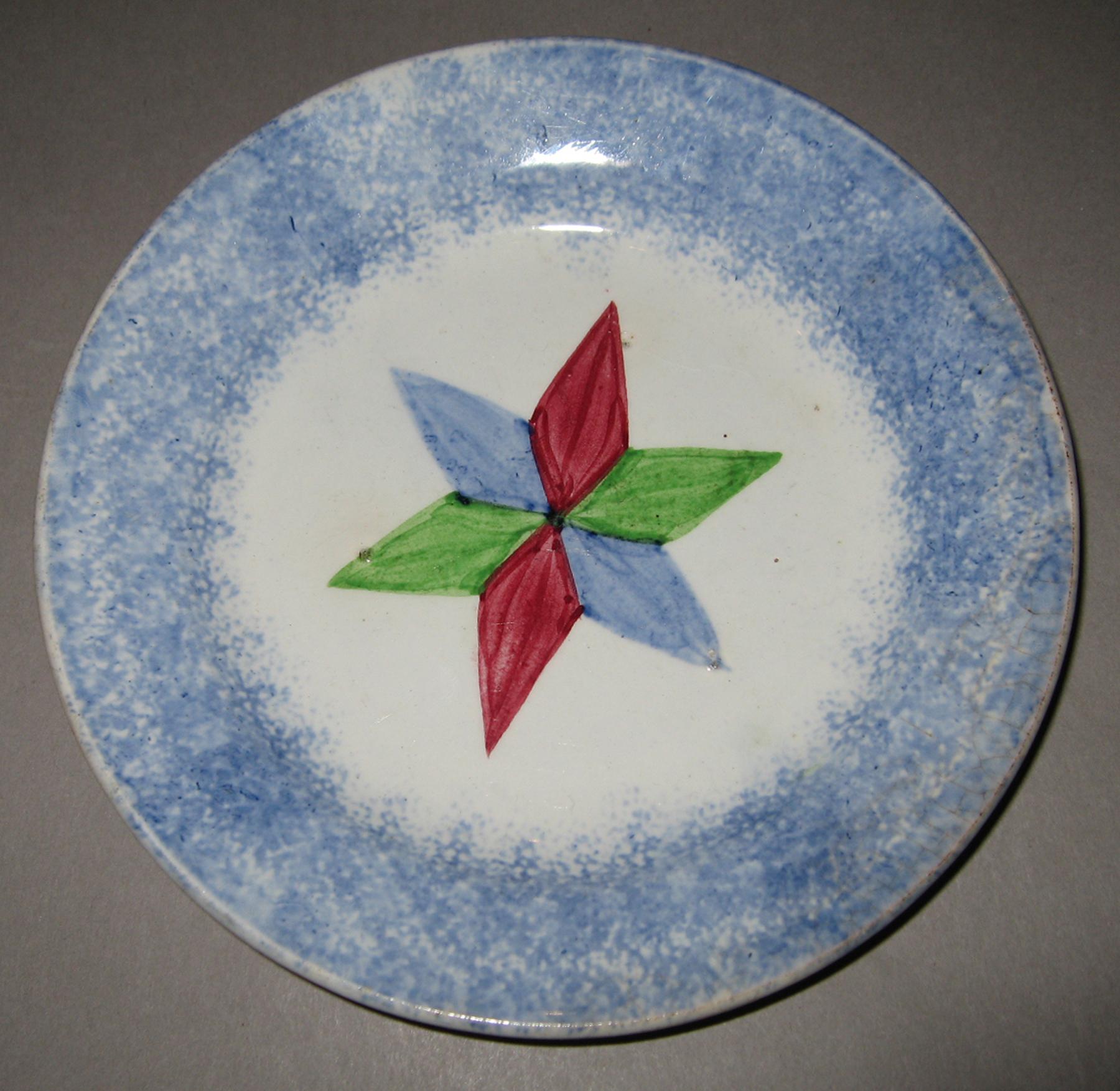 1964.1726 Spatterware saucer