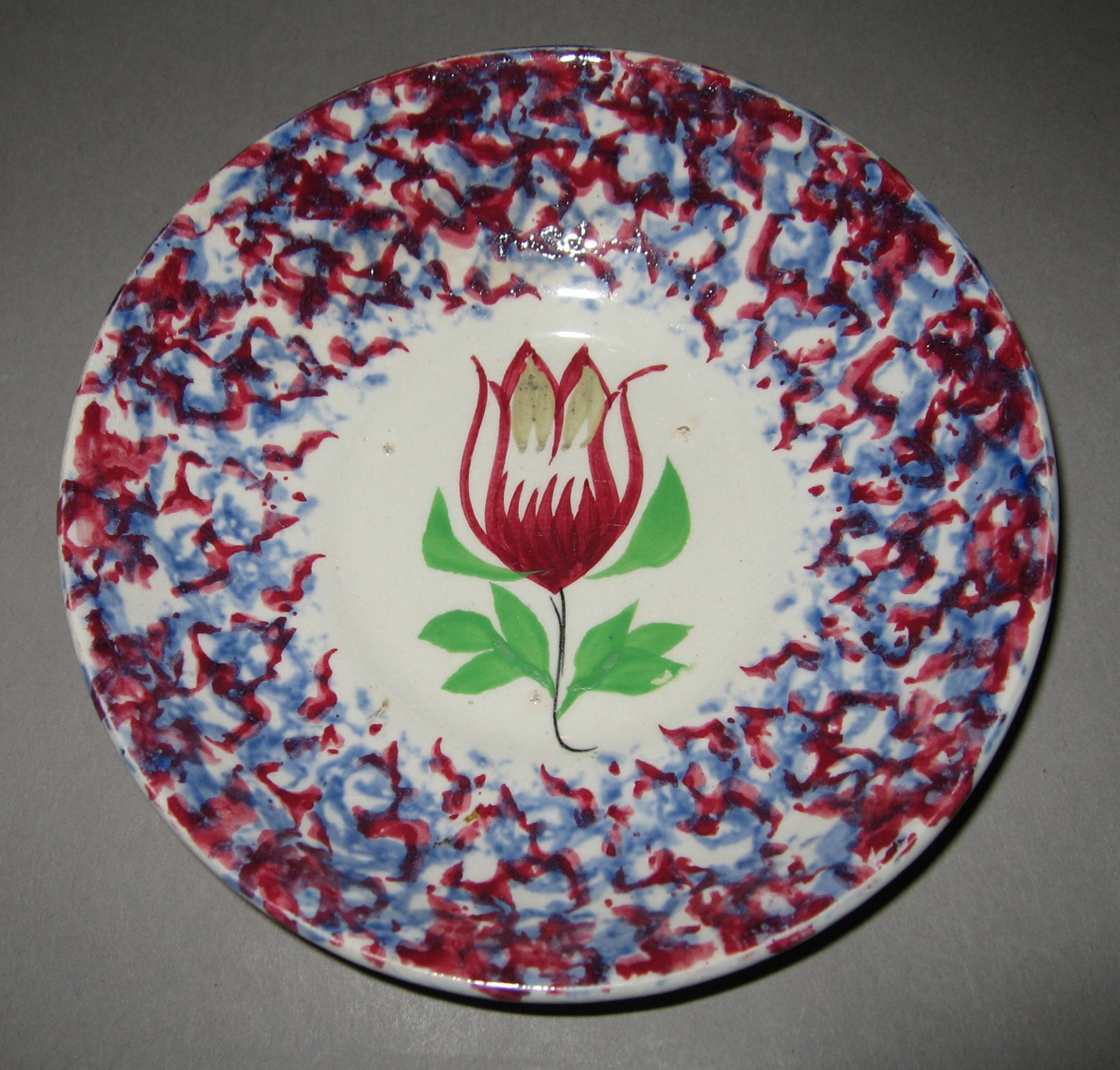 1964.1727 Spatterware saucer
