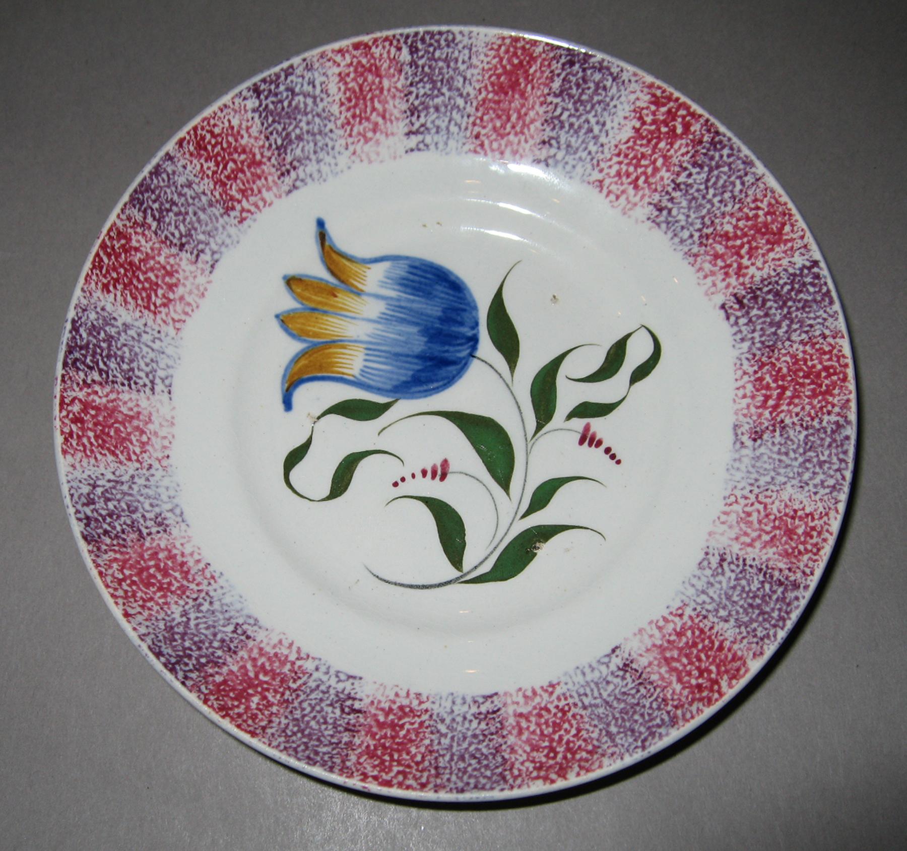 1964.1728 Spatterware saucer