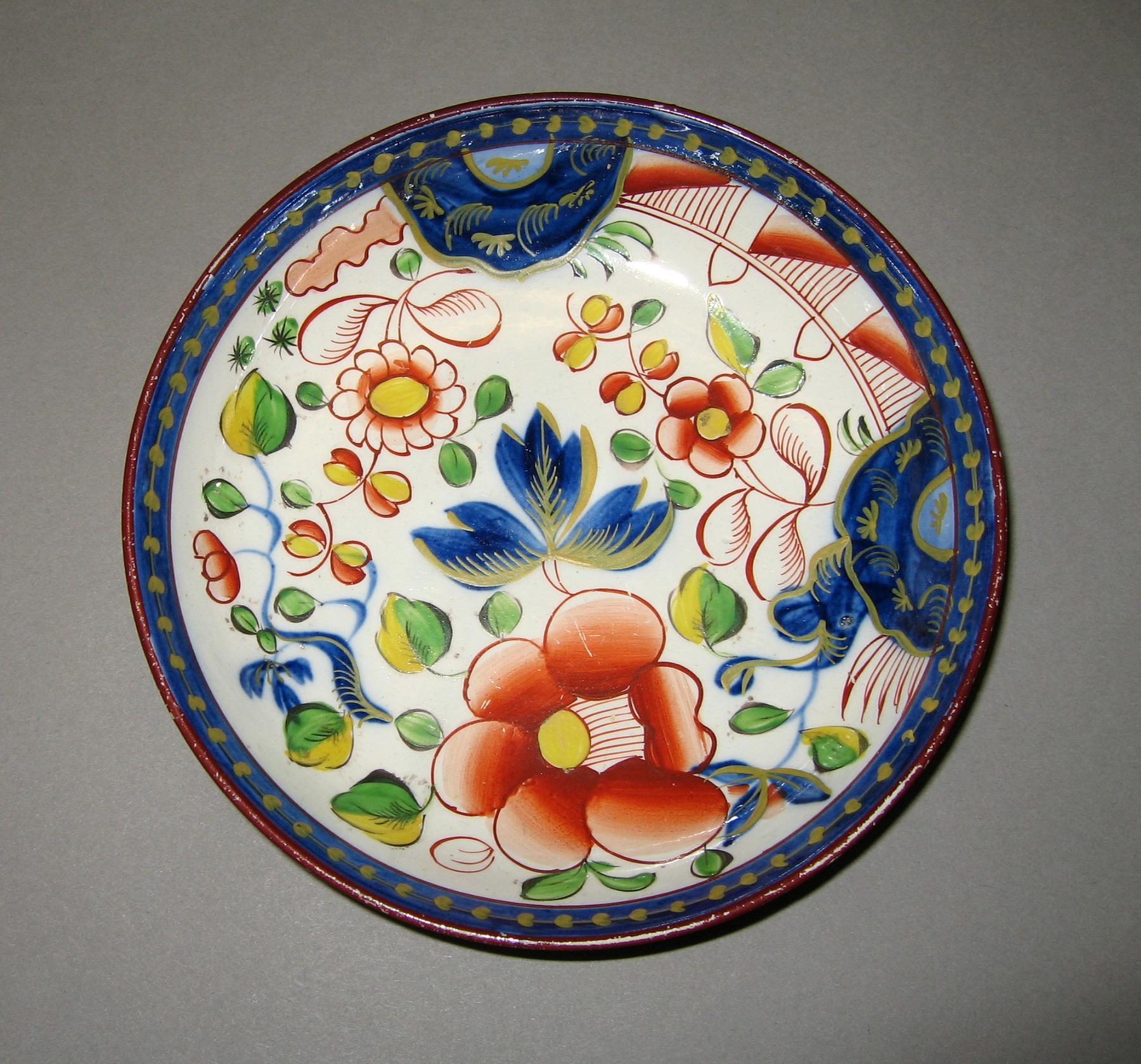 1964.1811.006 Single rose pattern saucer