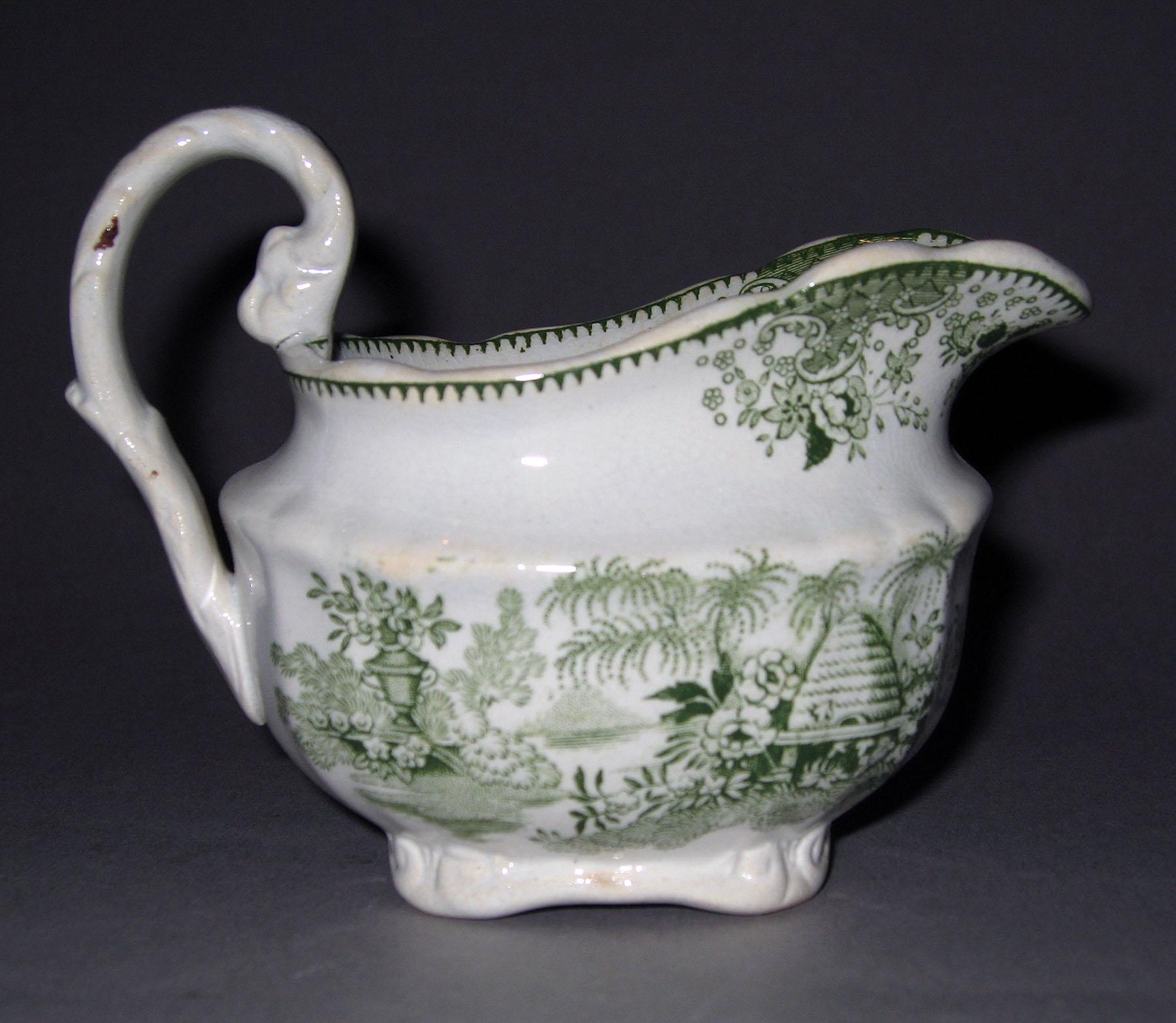 1964.0092.002 Earthenware cream pot