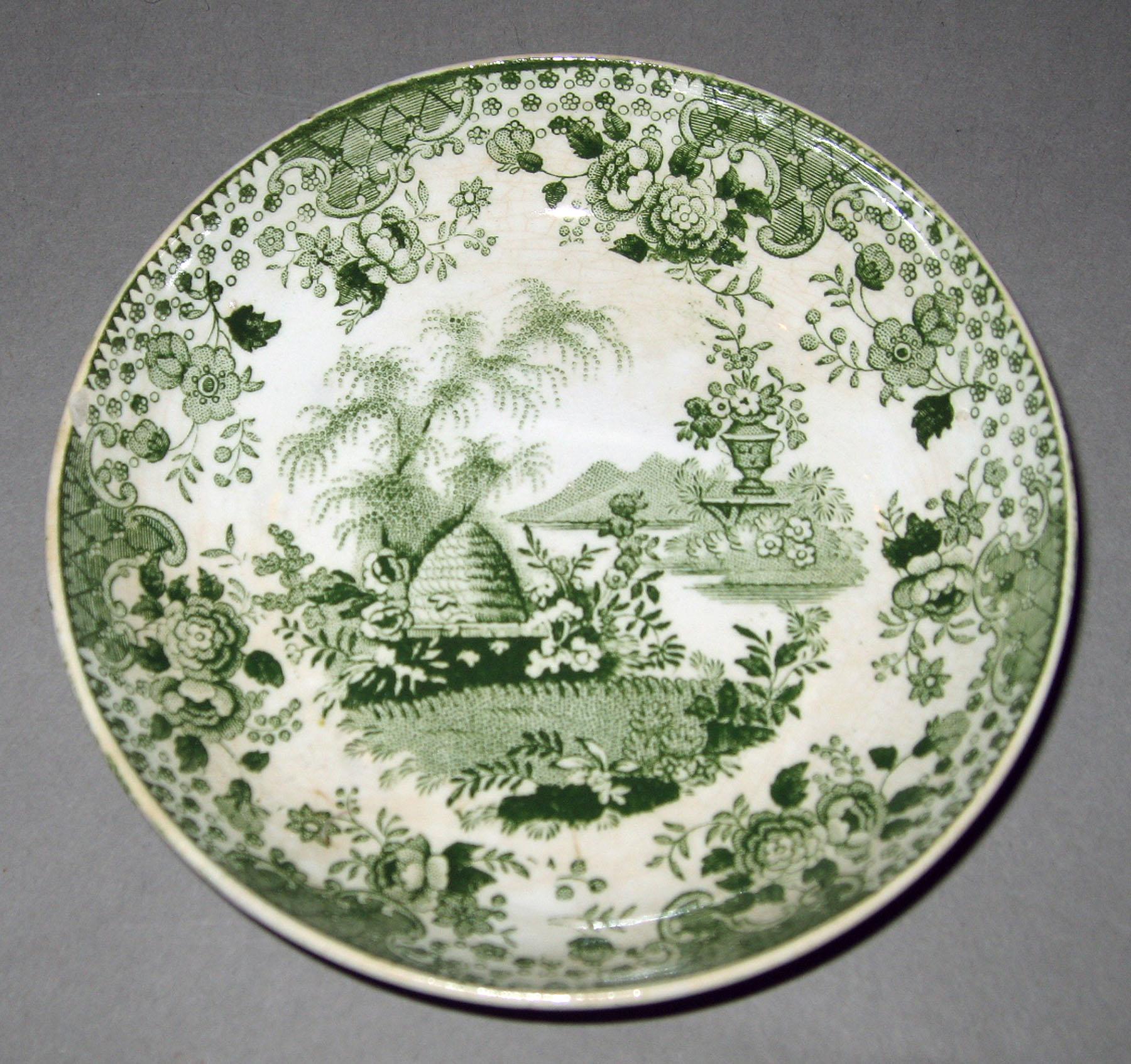 1964.0092.008 Earthenware saucer