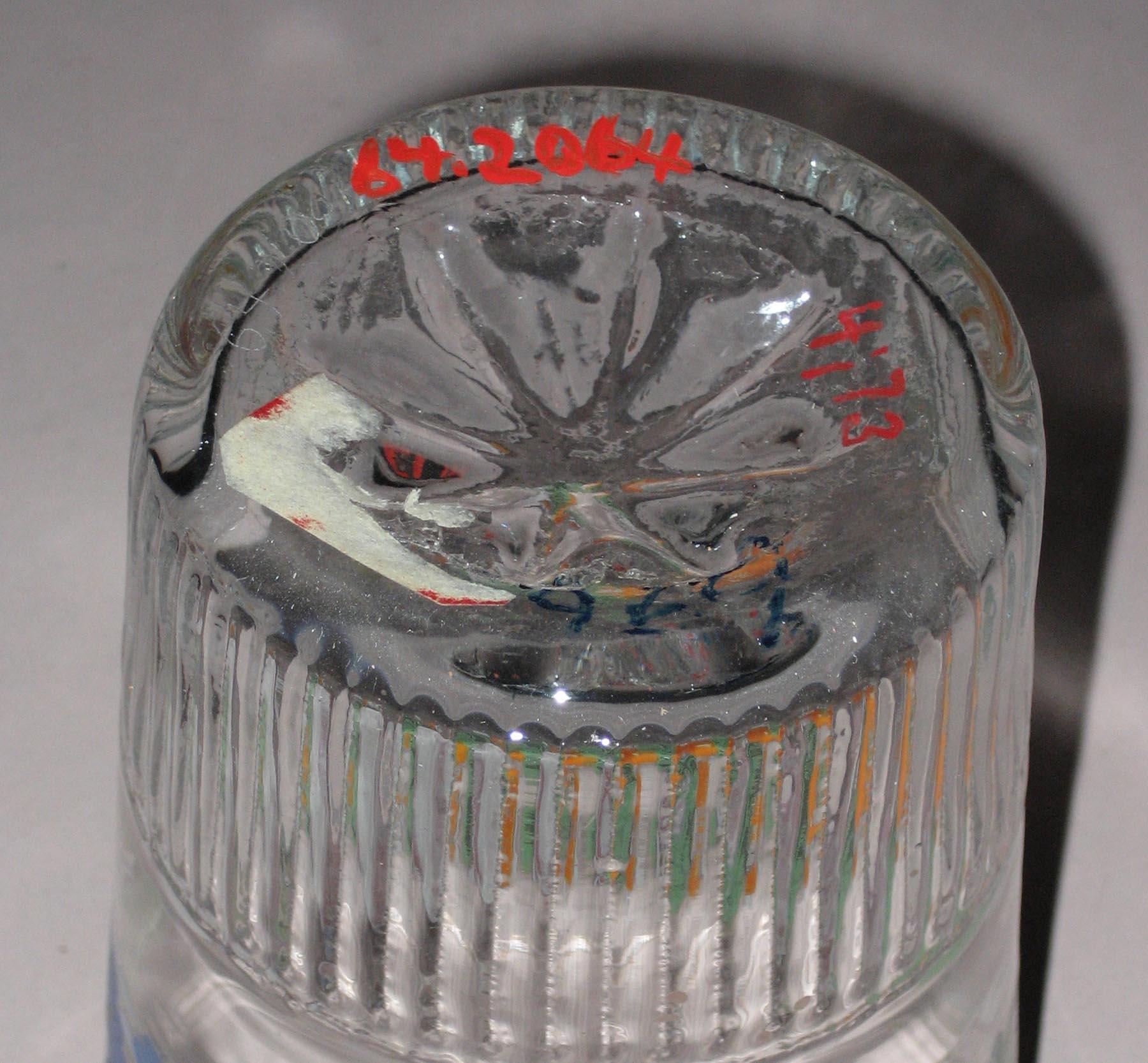 1964.2064 Glass tumbler or beaker (bottom)