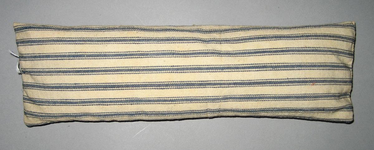 1964.2073 A Miniature bolster