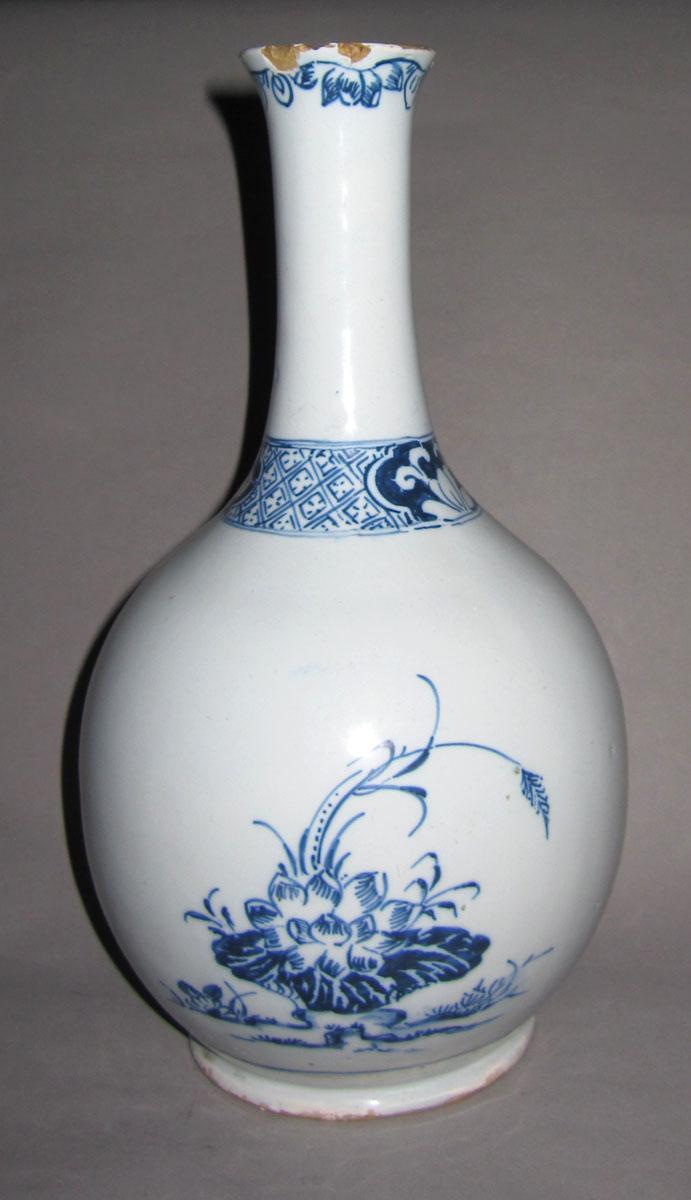 1964.2143 Stoneware bottle face 2