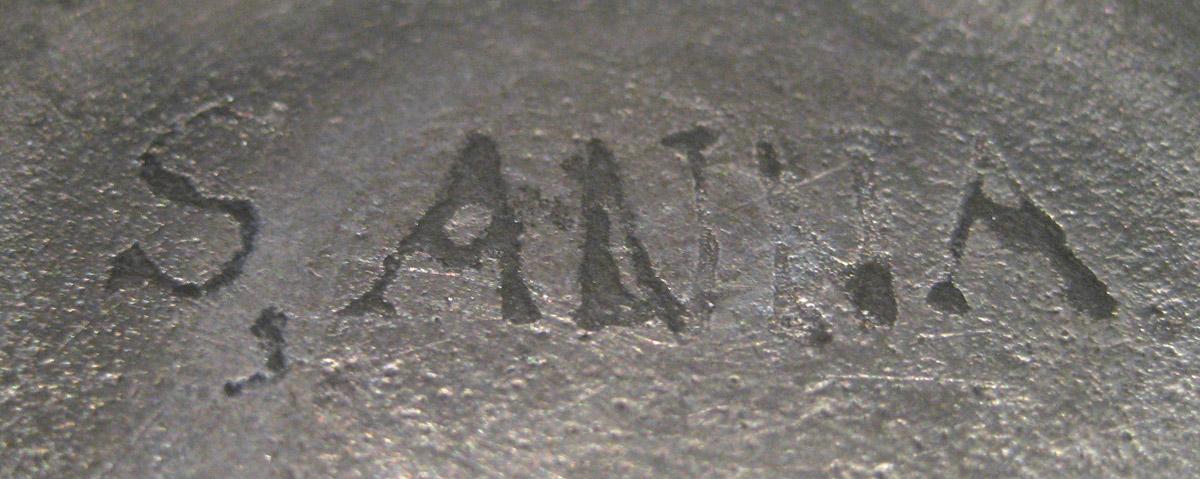1964.2167 A, B Inkwell (inscription)