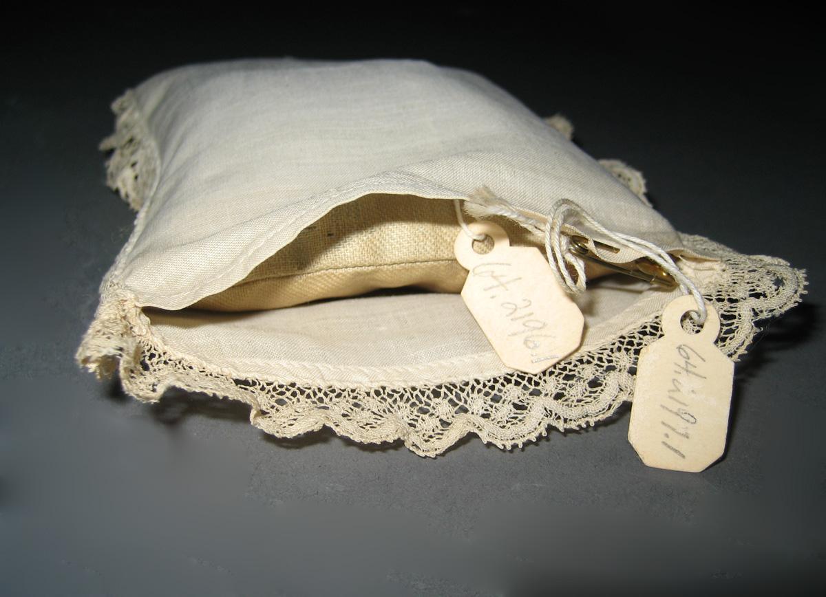 1964.2196.001 miniature pillow and 1964.2197.001 miniature pillowcase detail