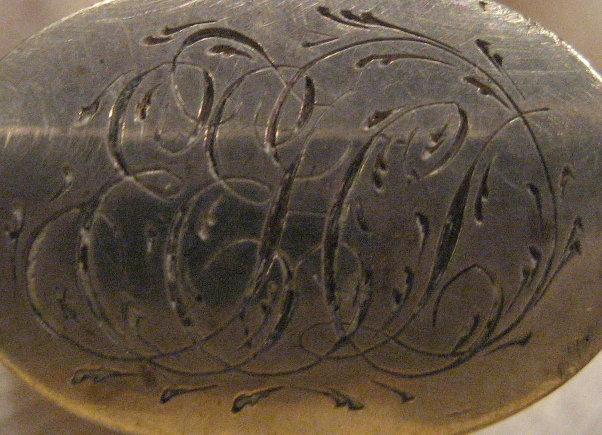 1965.0066.015 Knife (inscription)