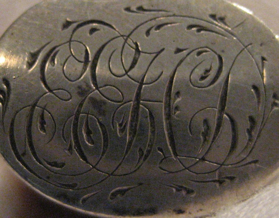 1965.0066.057 Fork (inscription)