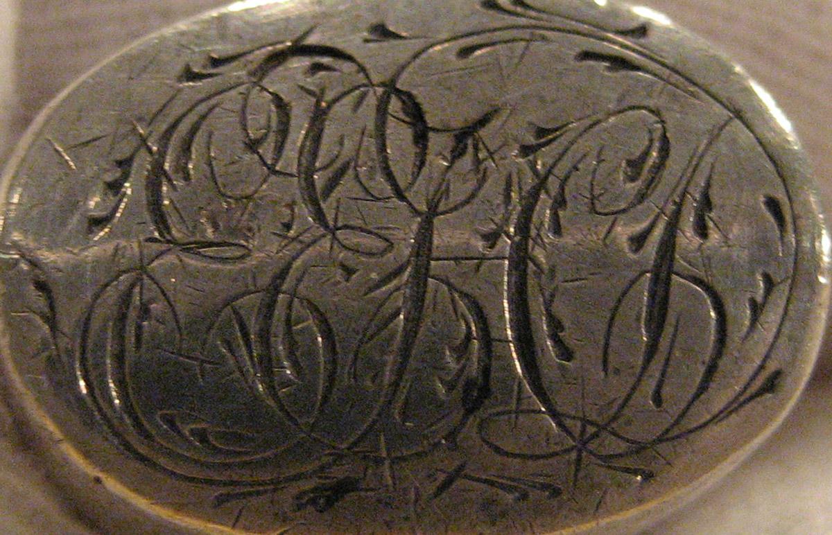 1965.0066.065 Knife (inscription)