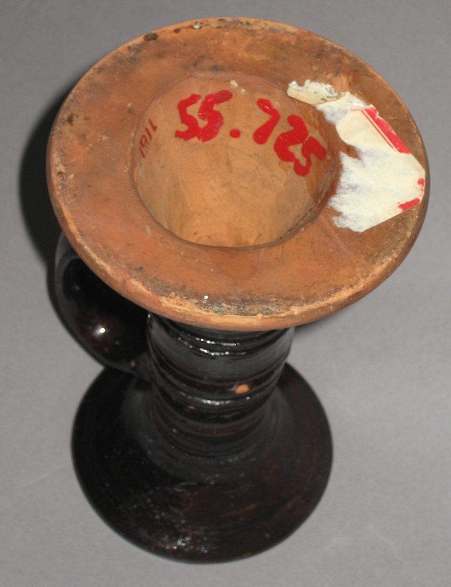 1955.0725 Earthenware Candlestick (bottom)