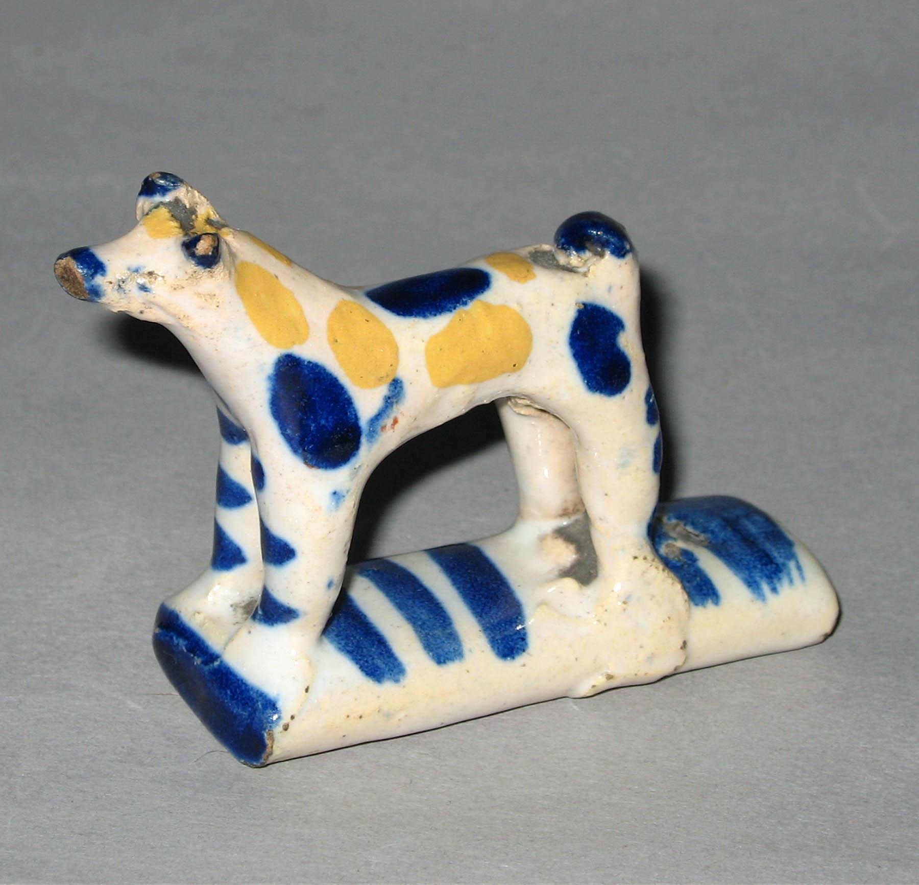 1965.0527 Earthenware figure of a dog