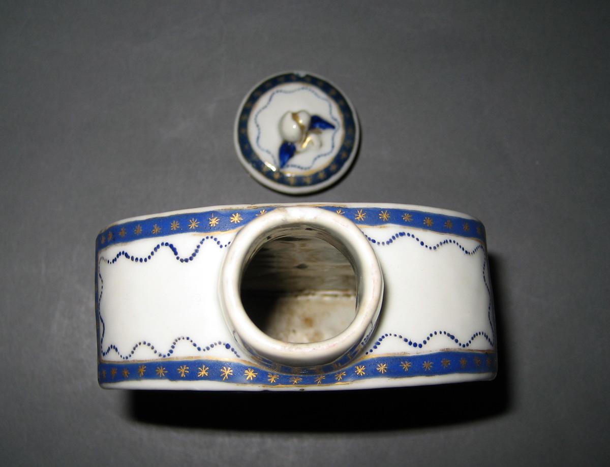 1965.0620 A, B Tea Cannister top view