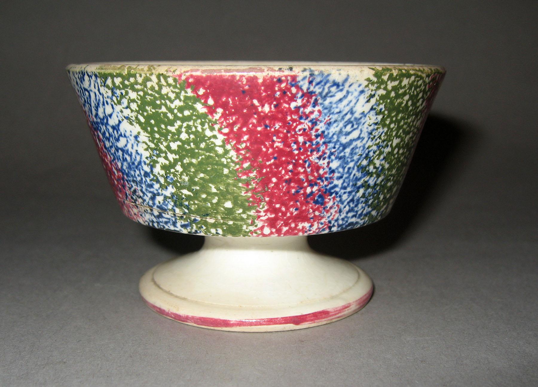 1965.0773 Rainbow spatterware salt dish