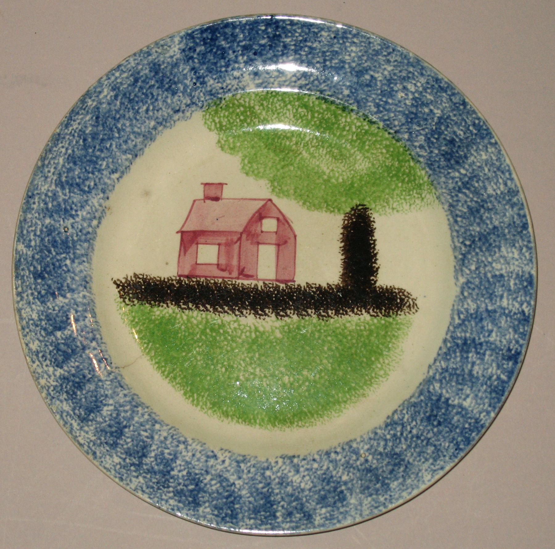 1965.0793.001 School House pattern spatterware plate