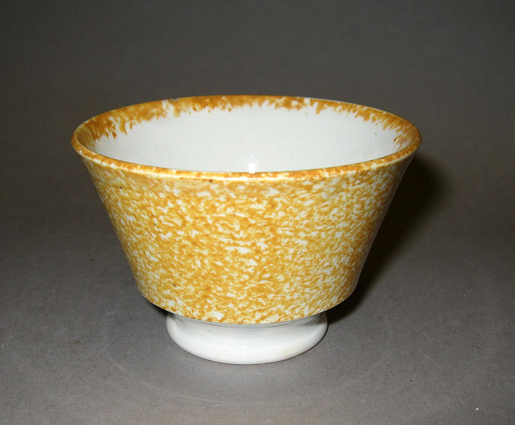 1965.0824.007 Yellow spatter teabowl