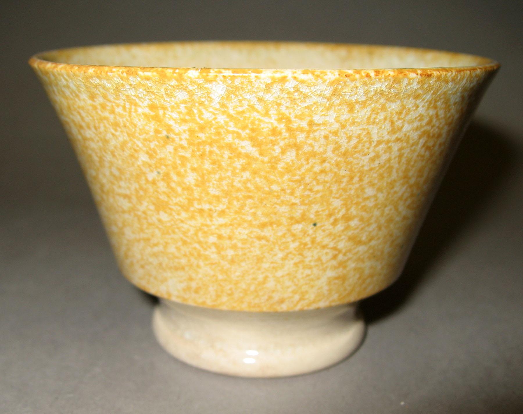1965.0824.008 Yellow spatter teabowl