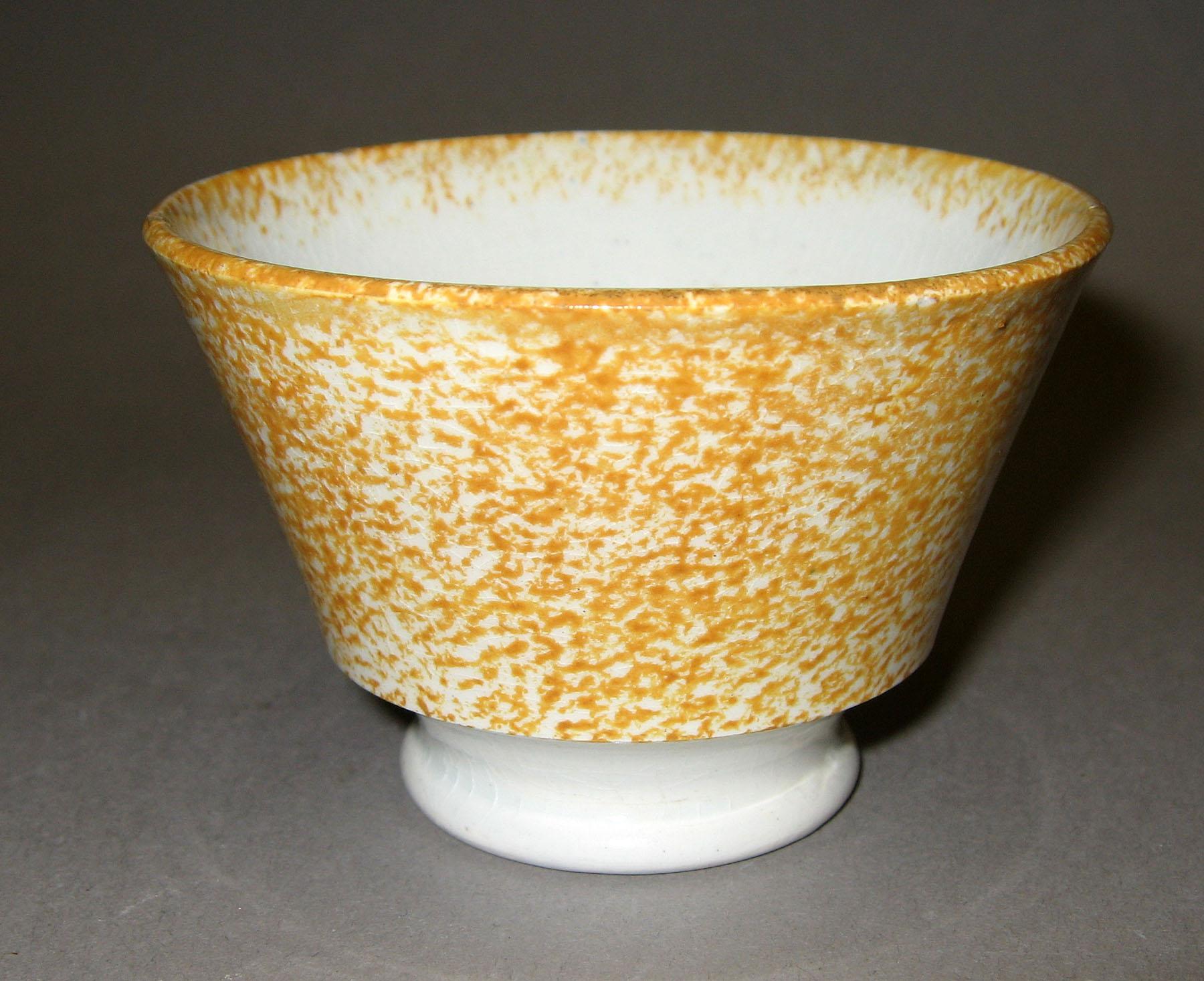 1965.0824.009 Yellow spatter teabowl