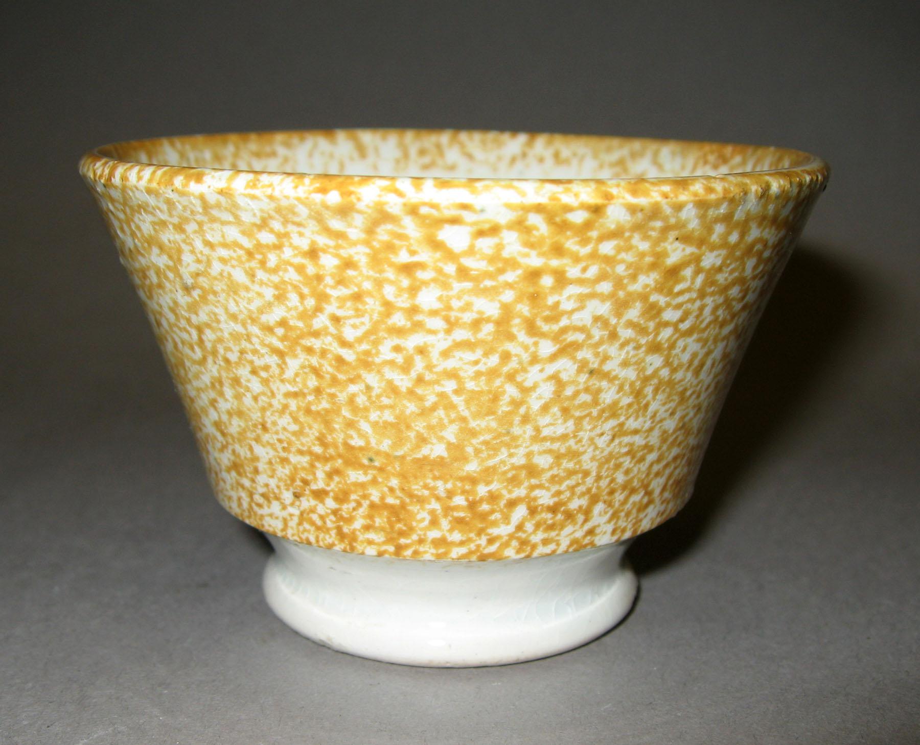 1965.0824.010 Yellow spatter teabowl