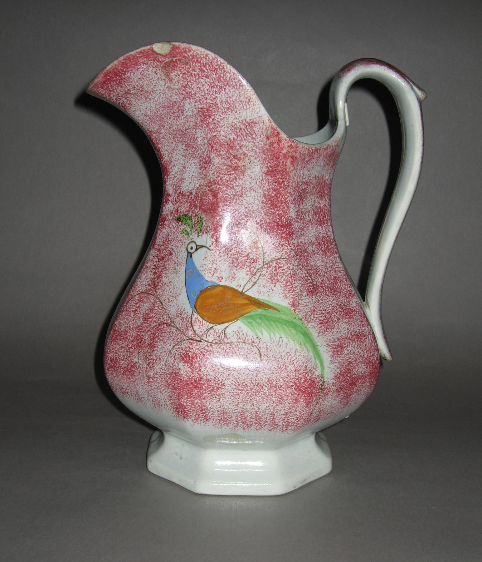1965.0838.001 Peafowl red spatterware jug